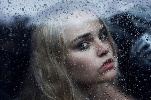girl behind the glass with water drops ad.jpg