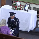 HB Mem Serv Being handed flag