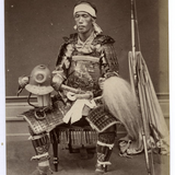 Original 19th century albumen photograph of a Japanese Samurai in armor.png