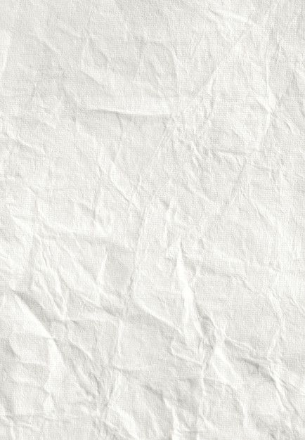 Premium Photo White crumpled paper sheet background for design.jpg