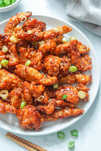 Crispy chicken coated in sweet chilli sauce.jpg