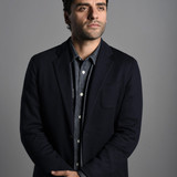 In this Sunday, Dec. 6, 2015 photo, actor Oscar Isaac poses during a promotion for the film "Star Wa