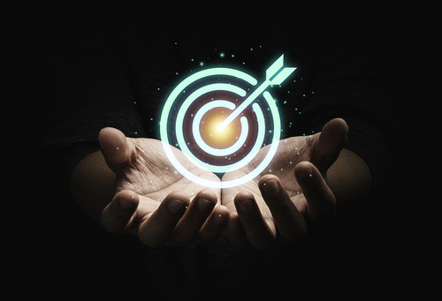 businessman holding virtual dartboard with arrow setup business achievement objective target concept.jpg