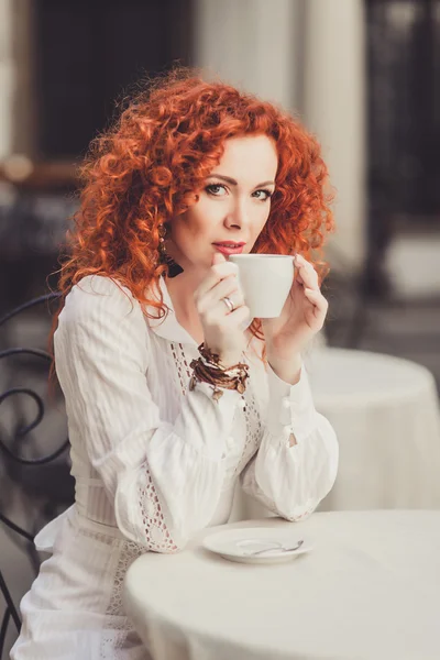 depositphotos 107130300 stock photo girl with red hair in.webp