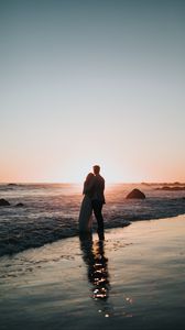 couple beach sunset 120844 168x300.jpg