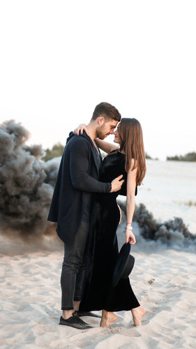 cute couple black clothing beach side iy 720x1280.jpg
