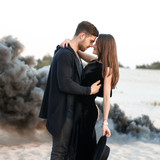 cute couple black clothing beach side iy 720x1280