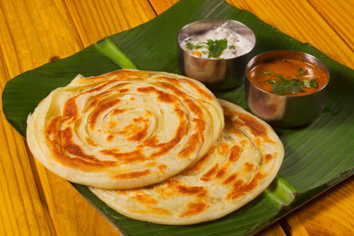 Kerala parotta, popularly known as paratha or porotta, is a delicacy from the state of Kerala.jpg