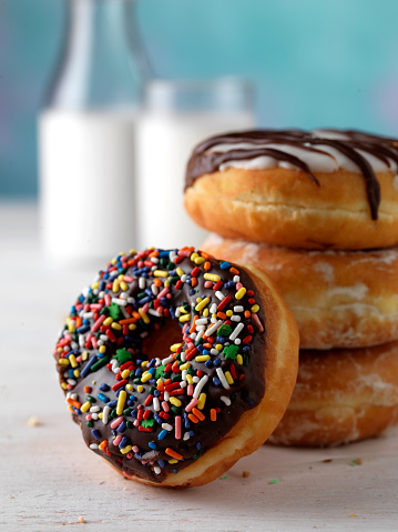 DIFFERENT KIND OF DONUTS, COLORS, FLAVORS, TABLE.jpg