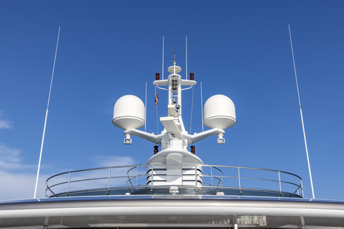 Communication antennas with navigation equipment, radar on the upper deck of the luxury white cruise.jpg