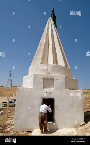 man in front of a yezidi temple near duhok northern iraq kurdistan KPCCHF.jpg