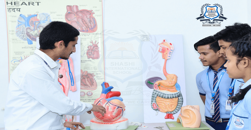 Shashi International School – Best School in Tundla.png