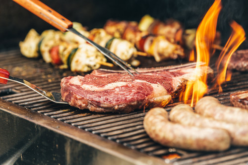 steak and flames on the grill.jpg