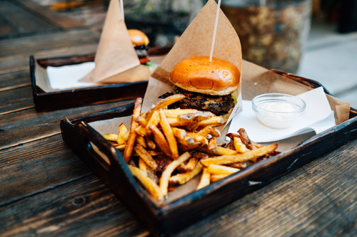 tray with fried a burger and a glass ramekin.jpg
