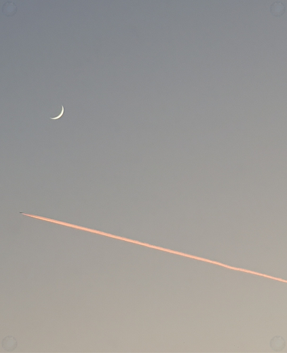 Crescent moon and jet plane at sunset ✈️ ??.png