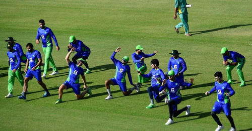 Pak team's taking a knee practice.jpg