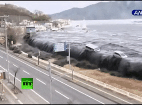 tsunami after earthquake swept the road t5eias86xtfsd3pj.gif