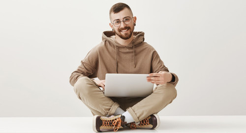handsome programmer working with laptop.jpg