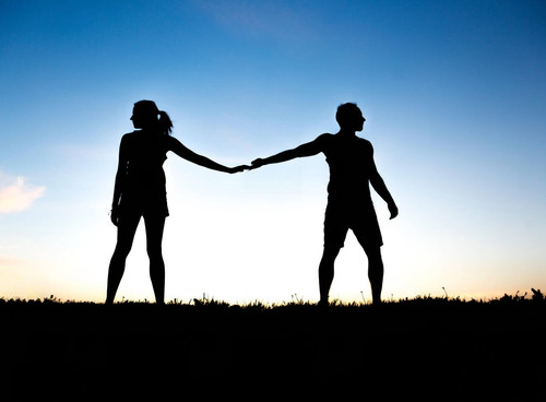 silhouette of romantic lovers with sunset on the back K3A22E transformed.jpg