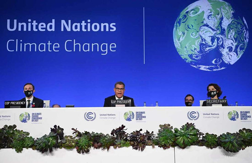 GLASGOW, SCOTLAND - NOVEMBER 13: COP26 President Alok Sharma (C) speaks during an informal plenary s.jpg