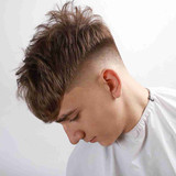 brushed forward french crop with a mid fade for guys with thick hair