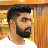 Fade Haircut with well trimmed beard Hairstyles For Men e1641298122636 285x300