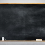 Blank Black Chalkboard on a Gray Background