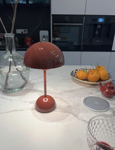 Its sleek design and vibrant colors have brought a new sense of style to my home. The lamp arrived q.jpg