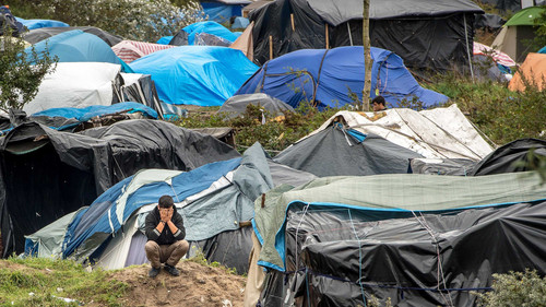 160926120039 21 calais jungle gettyimages 491651628 master.jpg