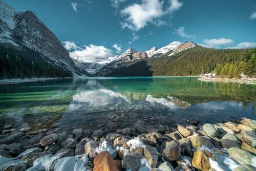breathtaking shot beautiful stones turquoise water lake hills background.jpg