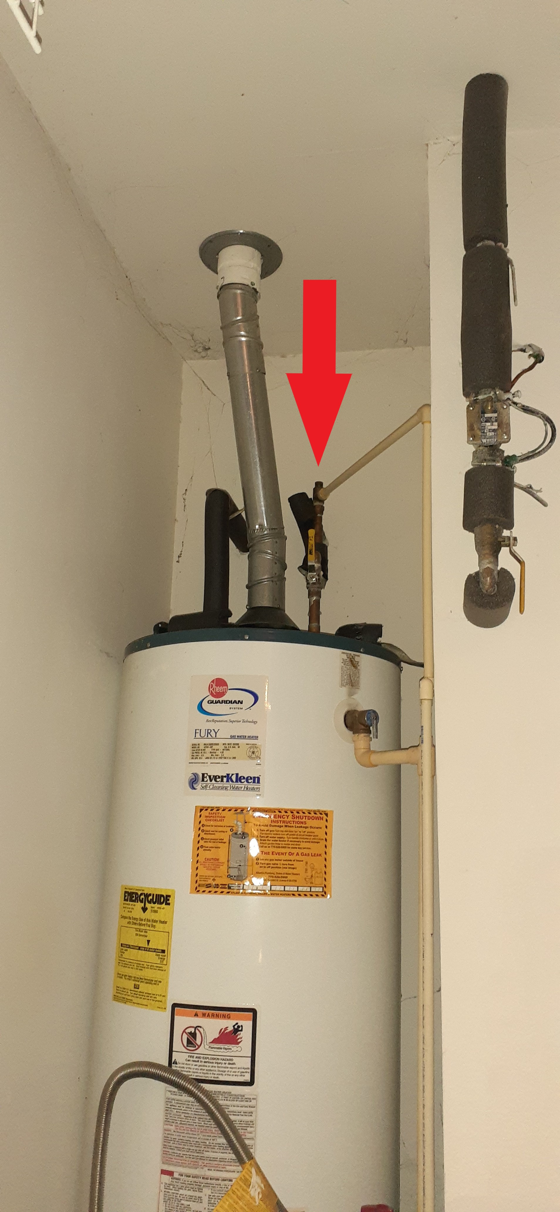 hot water heater dripping from overflow pipe