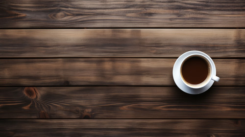 Coffee mug and tablet on wooden office table stock wallpaper ar 169 00293 00.jpg
