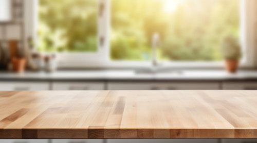 Wooden table on blurred kitchen bench background Empty wooden table and blurred kitchen background c.jpg