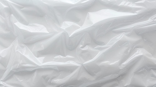 Transparant wrinkled plastic white plastic or polyethylene bag texture macro white background 00574 .jpg