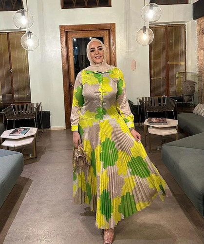 Photo by Hijab Queens on December 10, 2023. May be an image of 1 person, dress, skirt and sundress..jpg