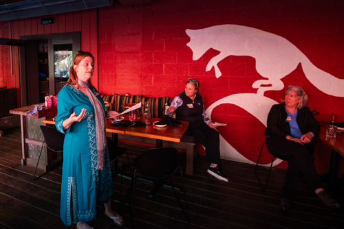 Laura LaVelle conducts a meeting of the Fairfield County Chapter of 100 Women Who Care at the Milestone restaurant. Photo by Justin McGown. 