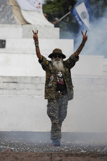 SAN SALVADOR, EL SALVADOR - JUNE 01: A protestor gestures during a demonstration against the Nayib B.jpg