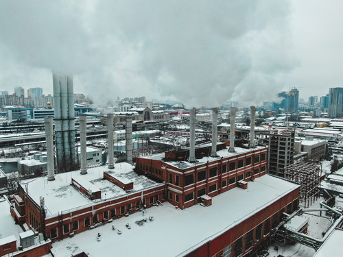 Aerial view of an industrial area with a factory. Chimney from the factory. Air pollution and the th.jpg