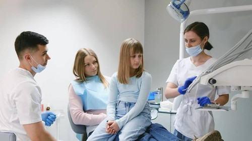 stock photo mom baby dentist painless dental treatment modern clinic positive family.jpg
