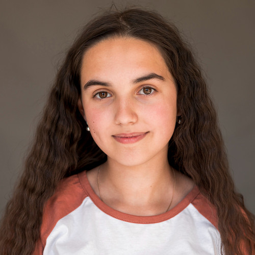 girl with long hair being happy.jpg