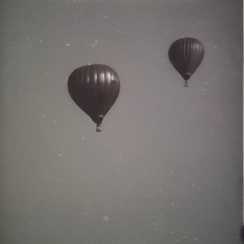 balloons+in+space?model=formulaxl&width=1024&height=1024&nologo=true&seed=47772000552704.jpg