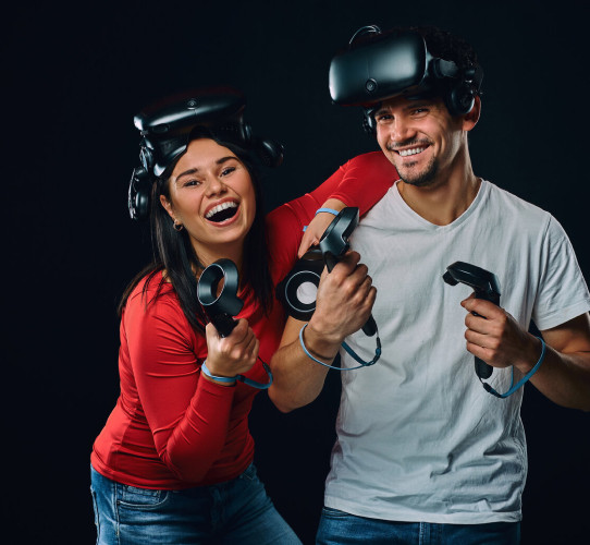 Couple playing VR game