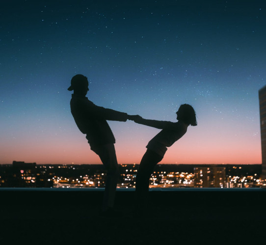 Couple holding hands