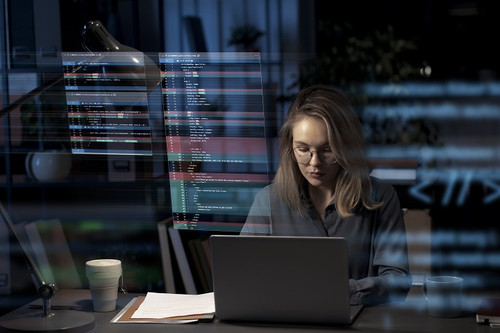programming background with person working with codes computer.jpg