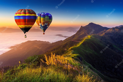 landscape of morning fog and mountains with hot air balloons at sunrise 335224 794.jpg