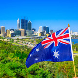 Australian flag waving aver Perth Water, a section of Swan River, and central business district of P