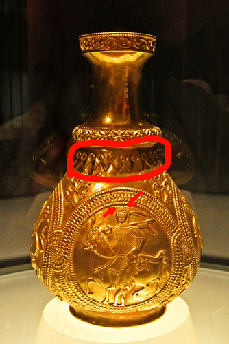 A jug with golden medallionsbbb.jpg