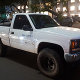 GMC 3500 HD 2001 branca vista de perfil