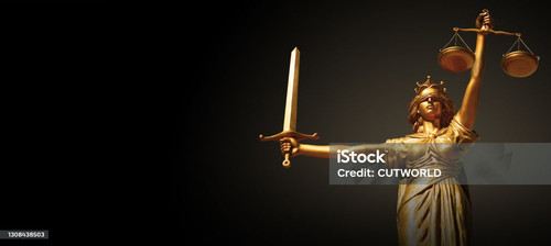 Goddess Themis of justice with a sword and scales in her hands..jpg