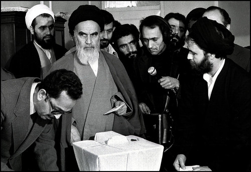 Ayatollah Khomeini, the leader and the founder of Iran's 1979 Islamic revolution at voting poll at h.jpg